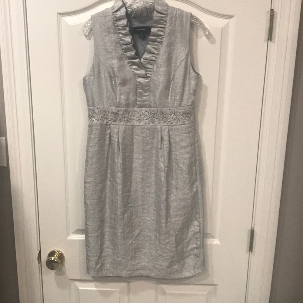 Shimmery grey dress with embossment on waist